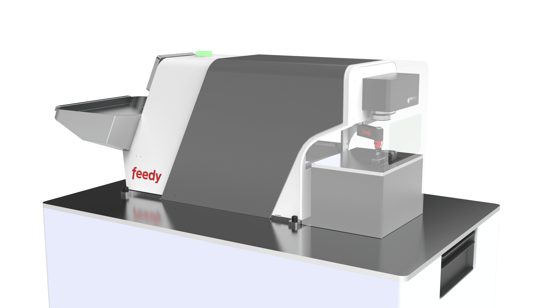 Eine moderne, kompakte Industriemaschine mit der Aufschrift feedy steht auf einer Theke. Sie hat ein großes graues und weißes Gehäuse, eine Rutsche auf der linken Seite und einen geschlossenen Arbeitsbereich auf der rechten Seite mit einer sichtbaren mechanischen Komponente.