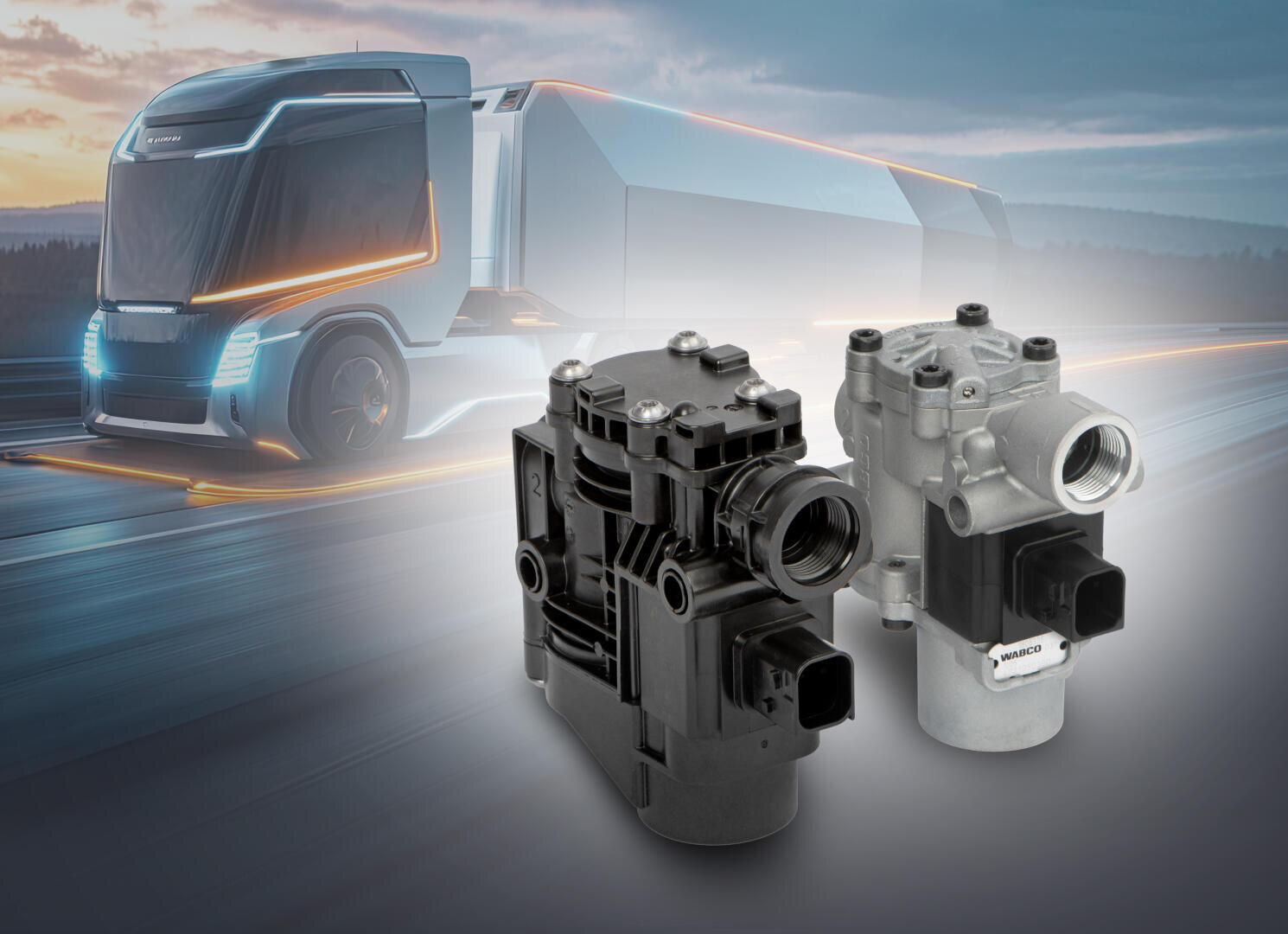 Im Vordergrund sind zwei Autoteile zu sehen, während im unscharfen Hintergrund ein futuristischer Lastwagen auf einer Straße fährt, was auf Innovationen in der Fahrzeugtechnologie hindeutet.